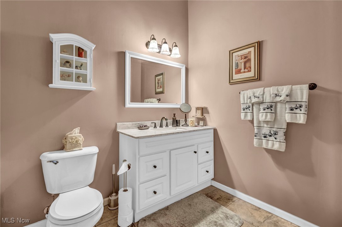 3887 Reeves Lane Medina, OH 44256 - Photo 39 of 42 Bathroom featuring vanity and toilet