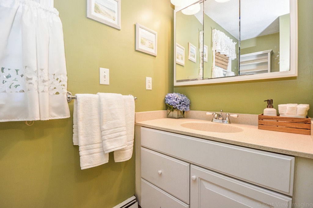 174 New Estate Road Littleton, MA 01460 - Photo 22 of 30 a bathroom with a sink and a mirror