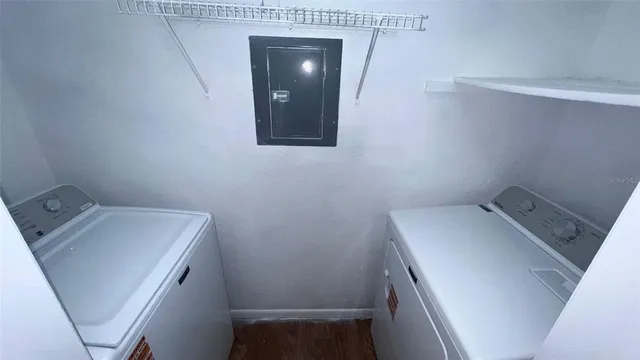 a utility room with dryer and washer