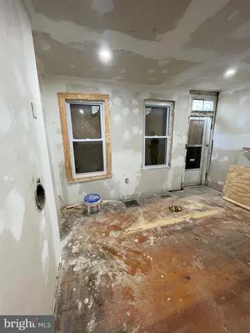 a room with a couch and a window