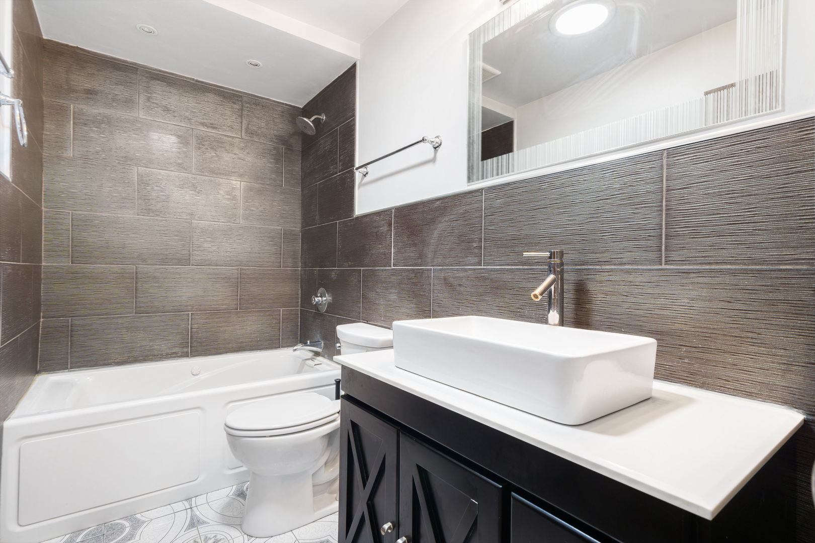 1200 Jacqueline Drive Crete, IL 60417 - Photo 12 of 21 a bathroom with a sink a toilet and shower