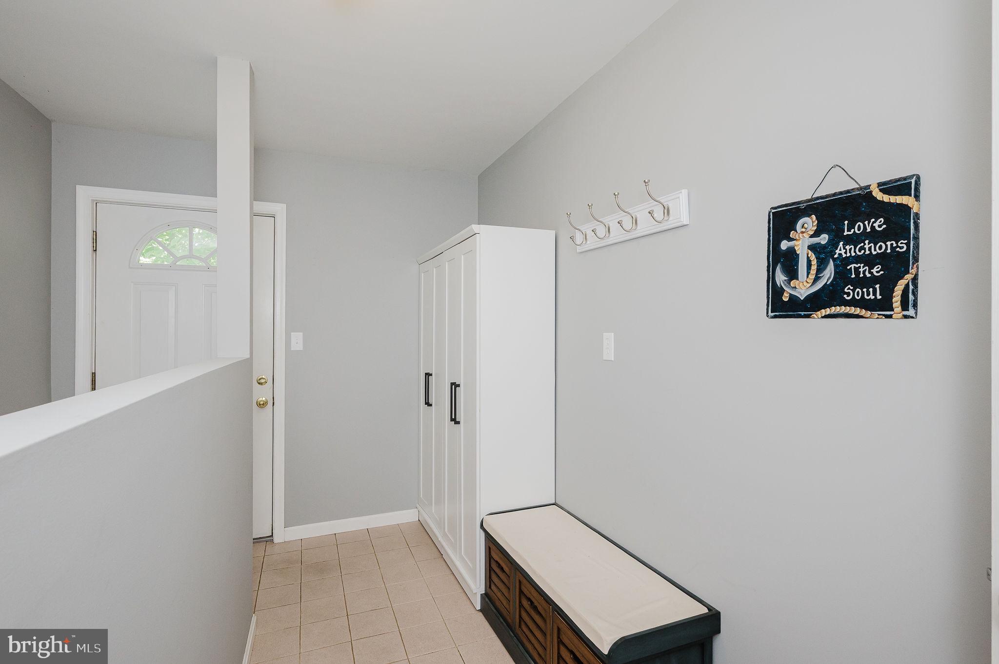 2222 Monocacy Road Essex, MD 21221 - Photo 31 of 70 Welcoming entry with coastal charm.
