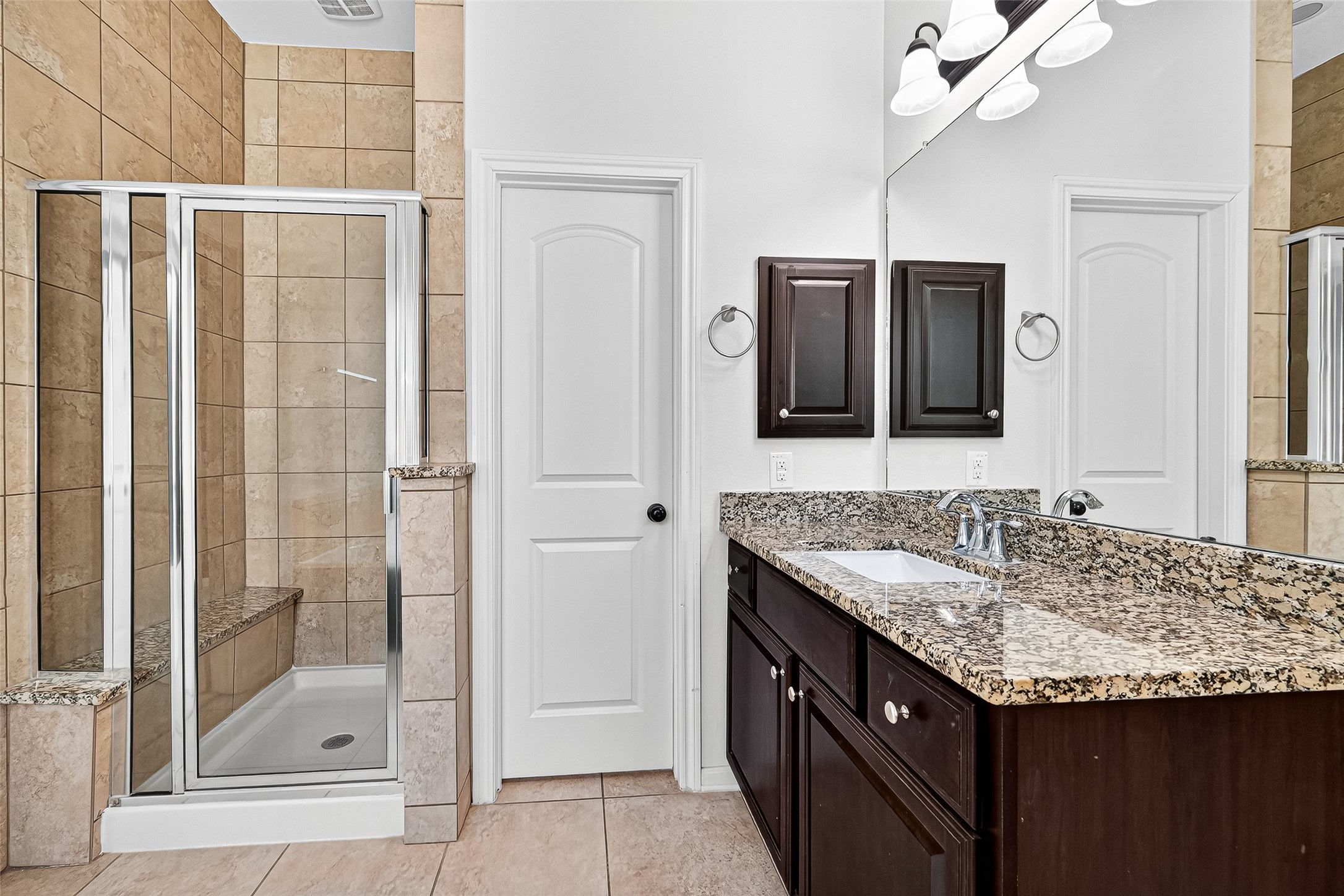 1531 Kent Valley Lane Rosenberg, TX 77471 - Photo 24 of 37 a bathroom with a granite countertop sink and a mirror
