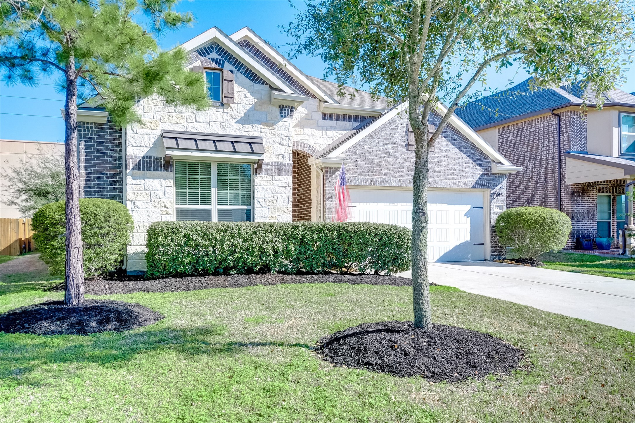 1531 Kent Valley Lane Rosenberg, TX 77471 - Photo 3 of 37 a front view of a house with a yard