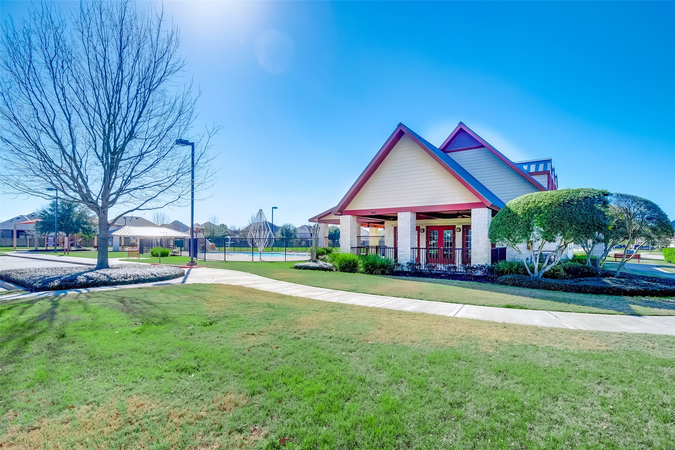 1531 Kent Valley Lane Rosenberg, TX 77471 - Photo 34 of 37 a view of a big house with a big yard plants and palm trees