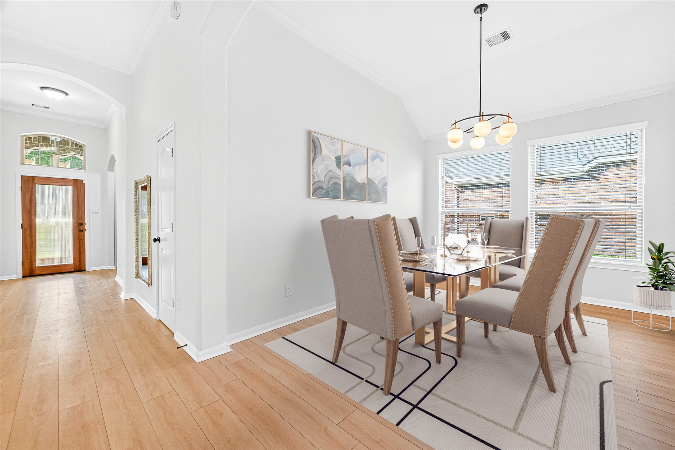 1531 Kent Valley Lane Rosenberg, TX 77471 - Photo 9 of 37 a view of a dining room with furniture window and wooden floor