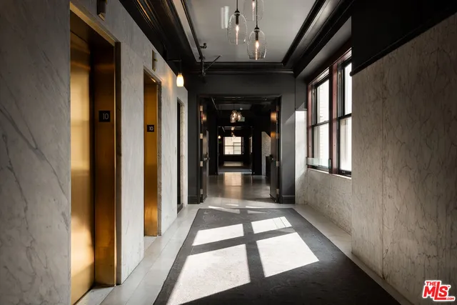 a view of gallery with windows