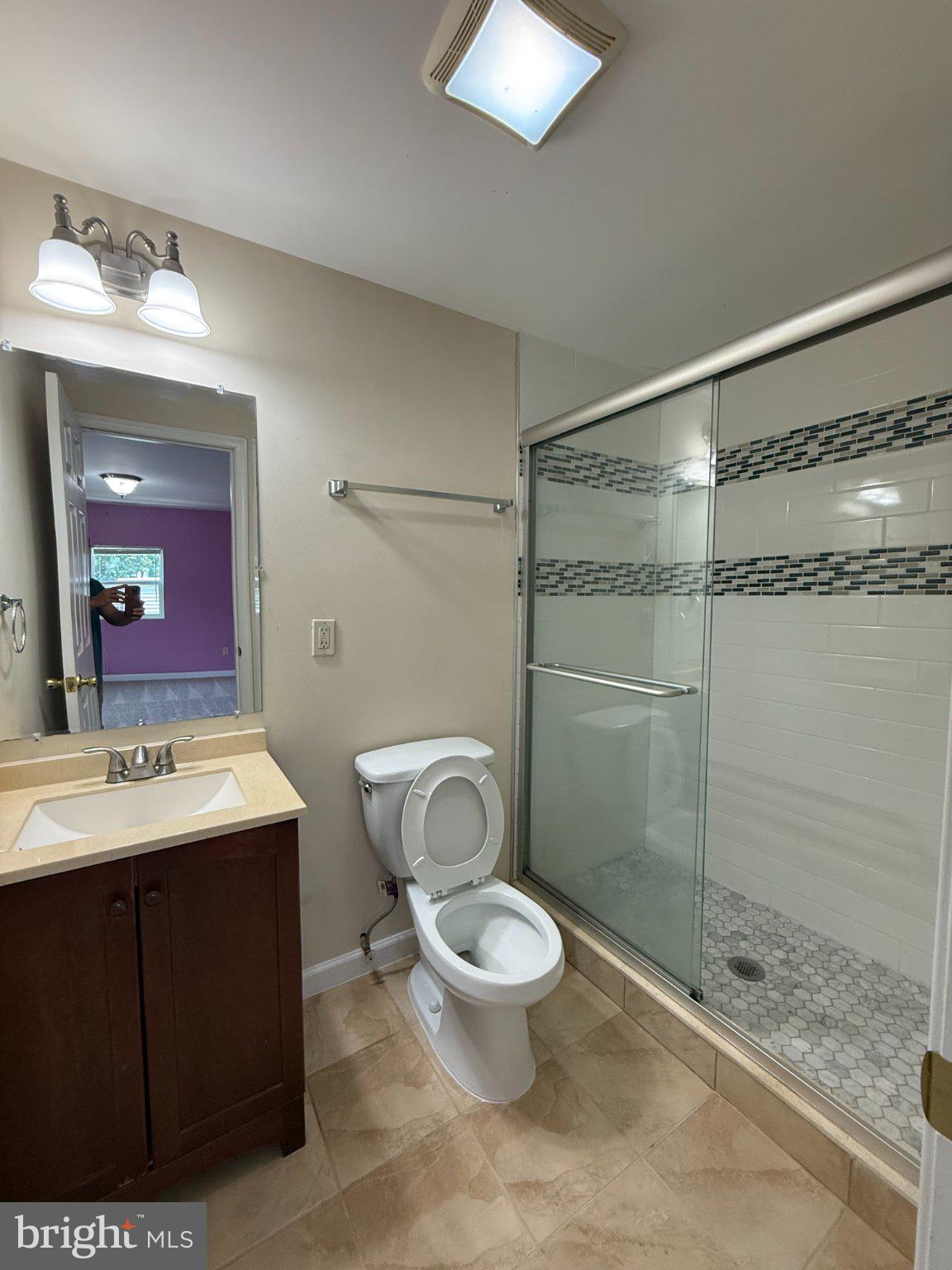 123 Winters Lane Baltimore, MD 21228 - Photo 17 of 28 Modern bathroom with sleek finishes.