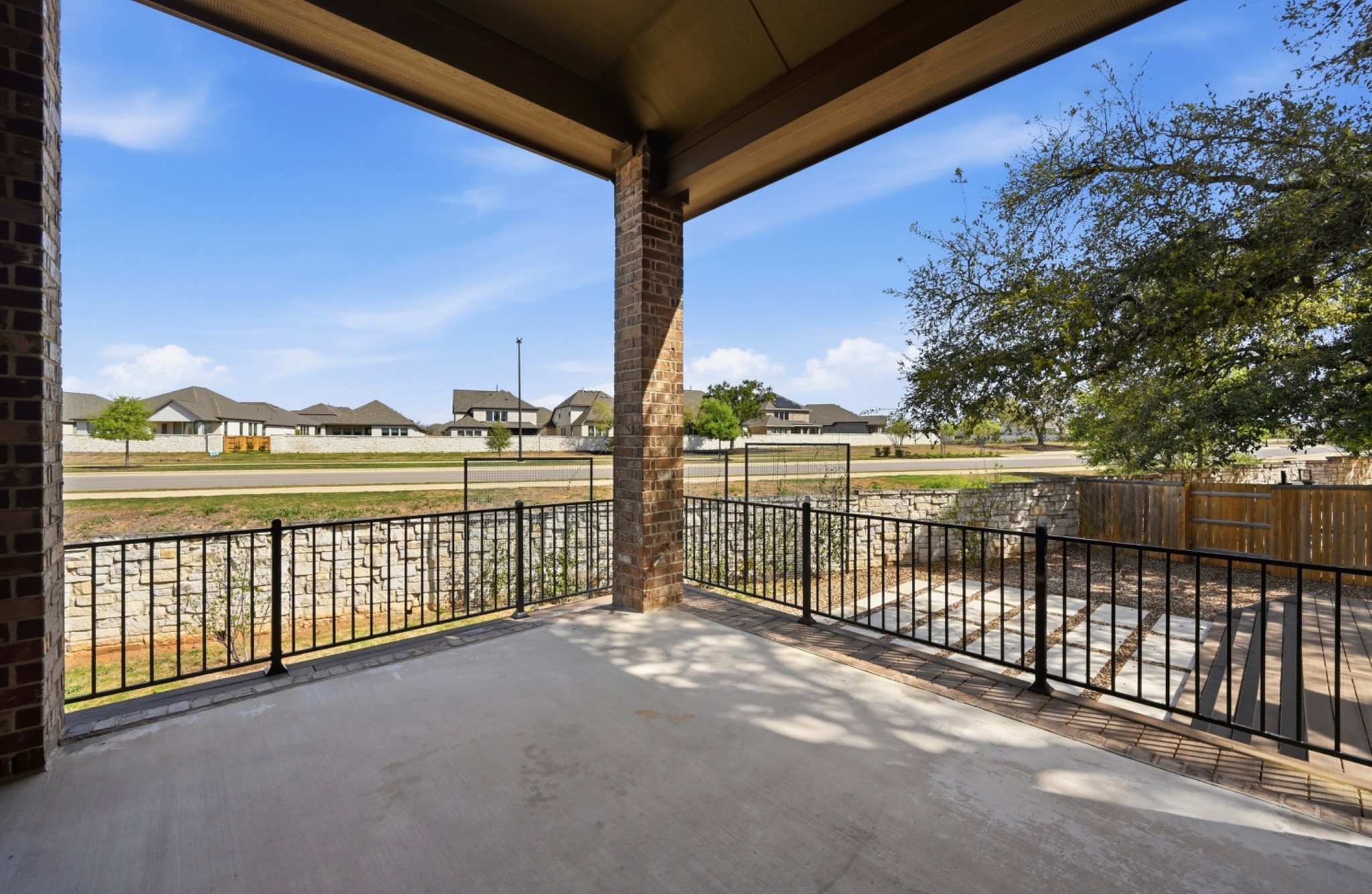 208 West Branch Road Kyle, TX 78640 - Photo 19 of 27 A covered patio gives generous space to lounge or dine.