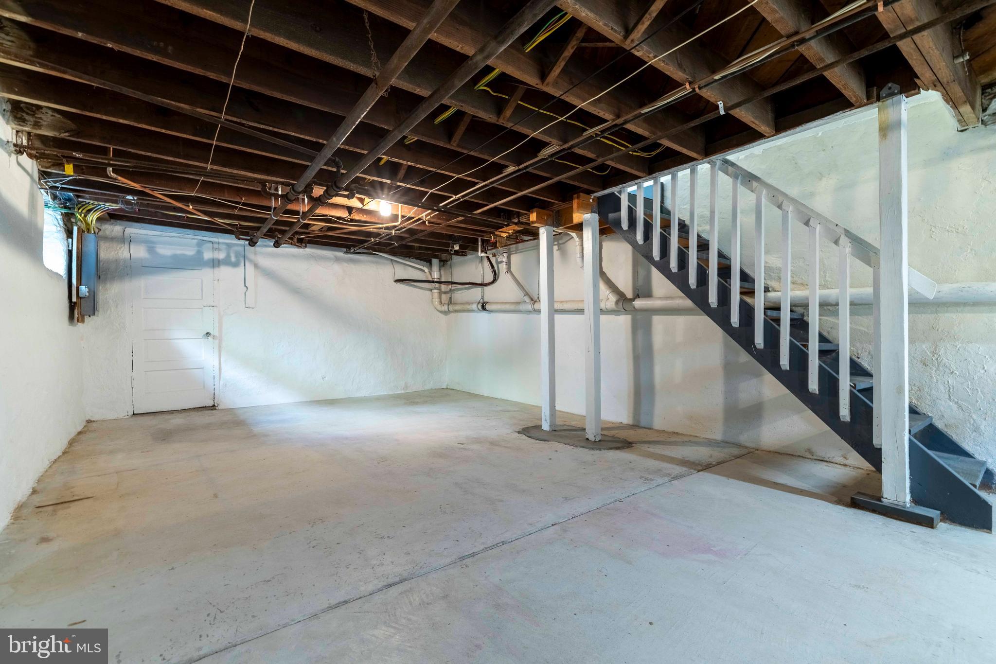 229 Wayne Avenue Narberth, PA 19072 - Photo 30 of 35 a view of an empty room with stairs