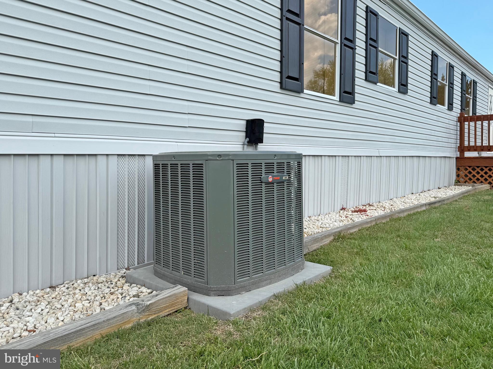 22 Sunnyfield Road, Unit E13 Rehoboth Beach, DE 19971 - Photo 27 of 36 AC Condenser