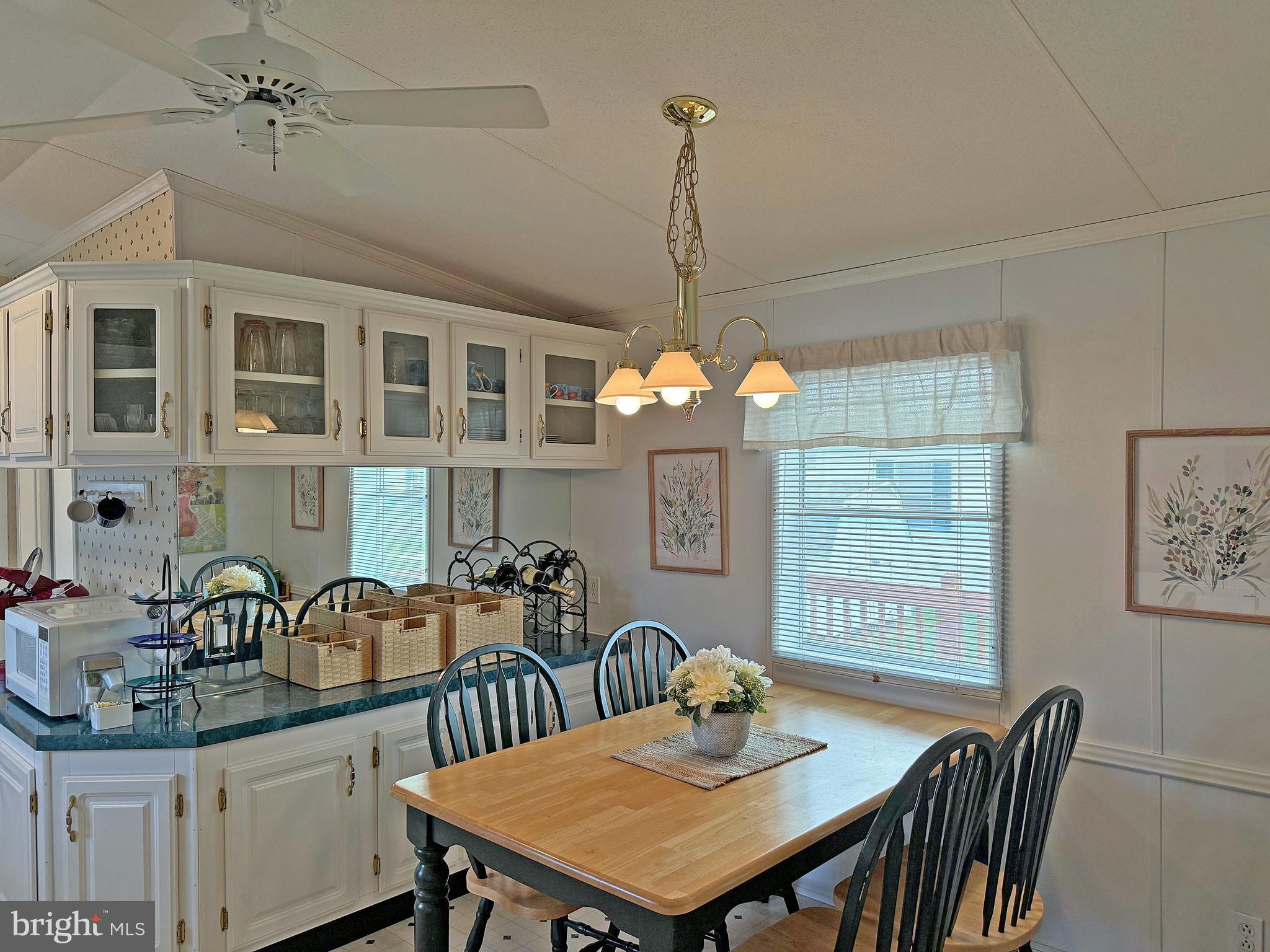 22 Sunnyfield Road, Unit E13 Rehoboth Beach, DE 19971 - Photo 6 of 36 Dining Area with Extra Cabinets