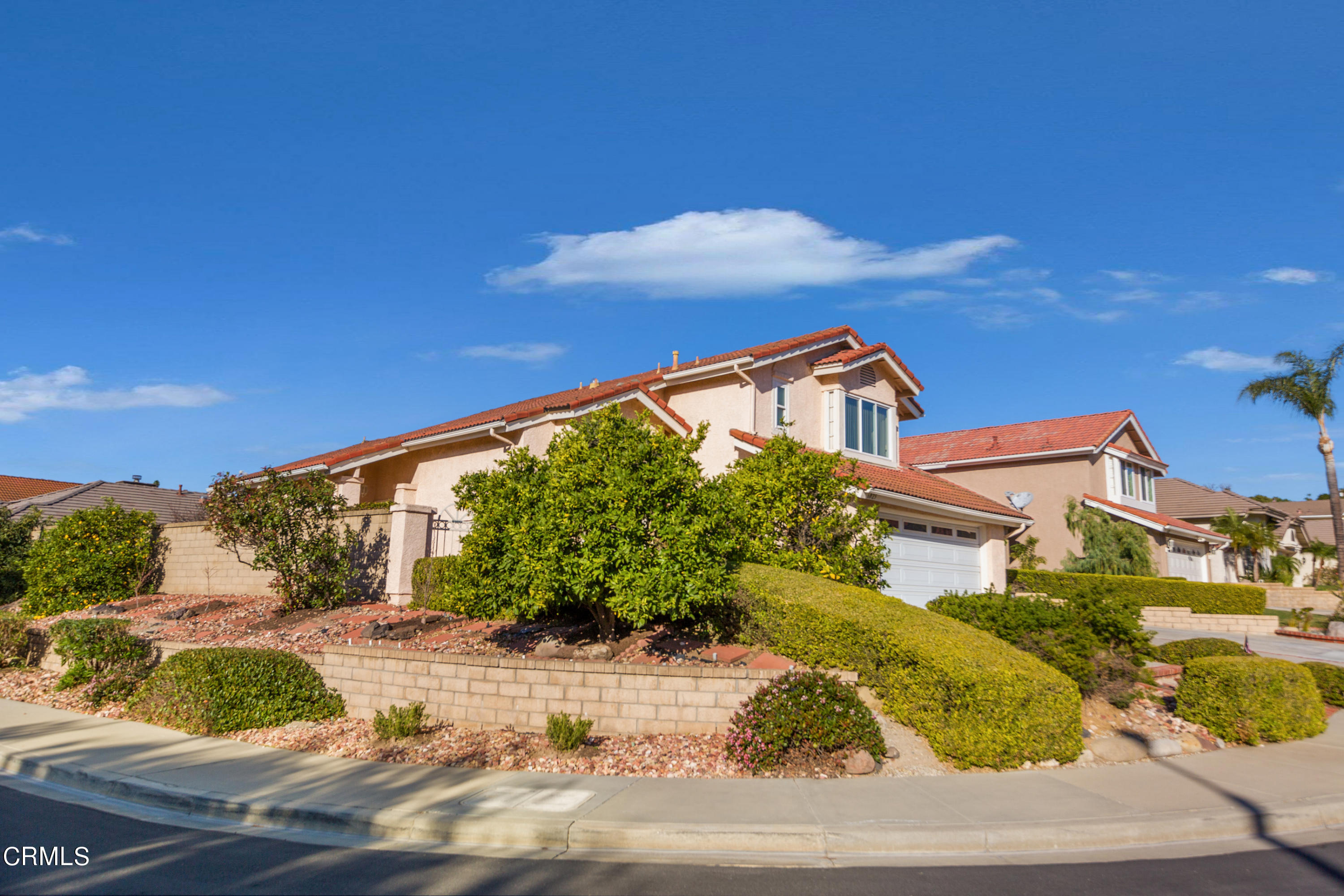 6025 Palomar Circle Camarillo, CA 93012 - Photo 2 of 35 front view of a house with a yard