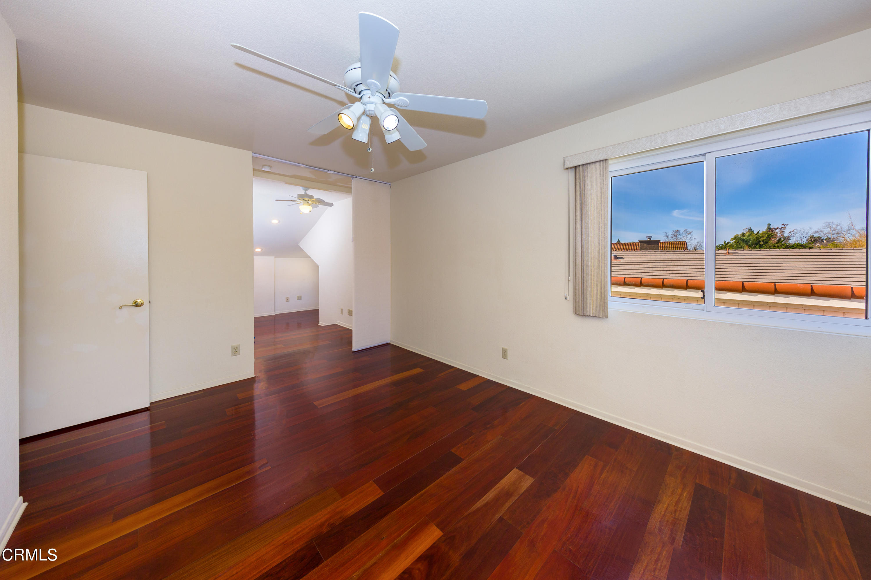 6025 Palomar Circle Camarillo, CA 93012 - Photo 25 of 35 wooden floor in an empty room with a window