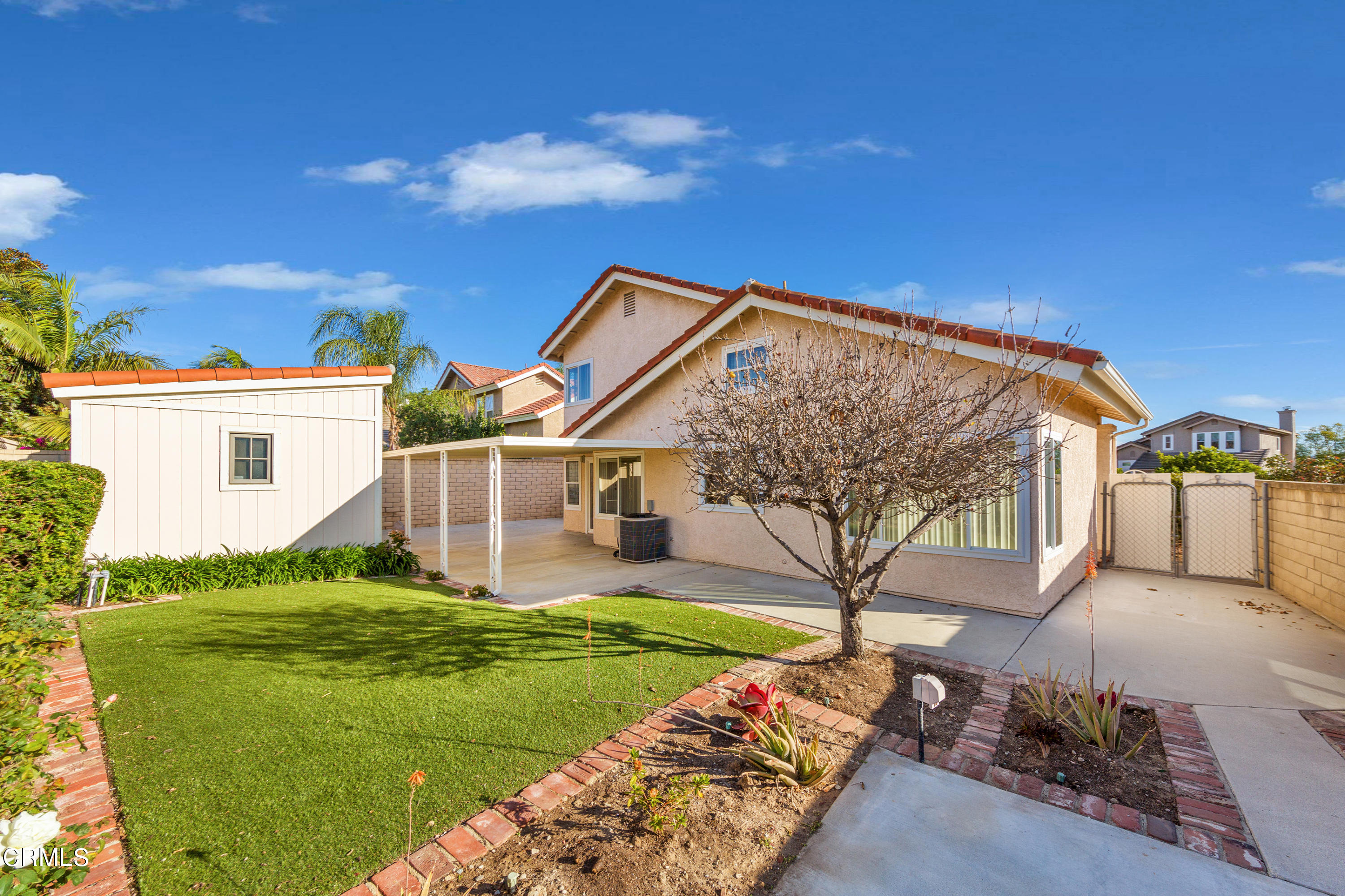 6025 Palomar Circle Camarillo, CA 93012 - Photo 29 of 35 a front view of a house with garden