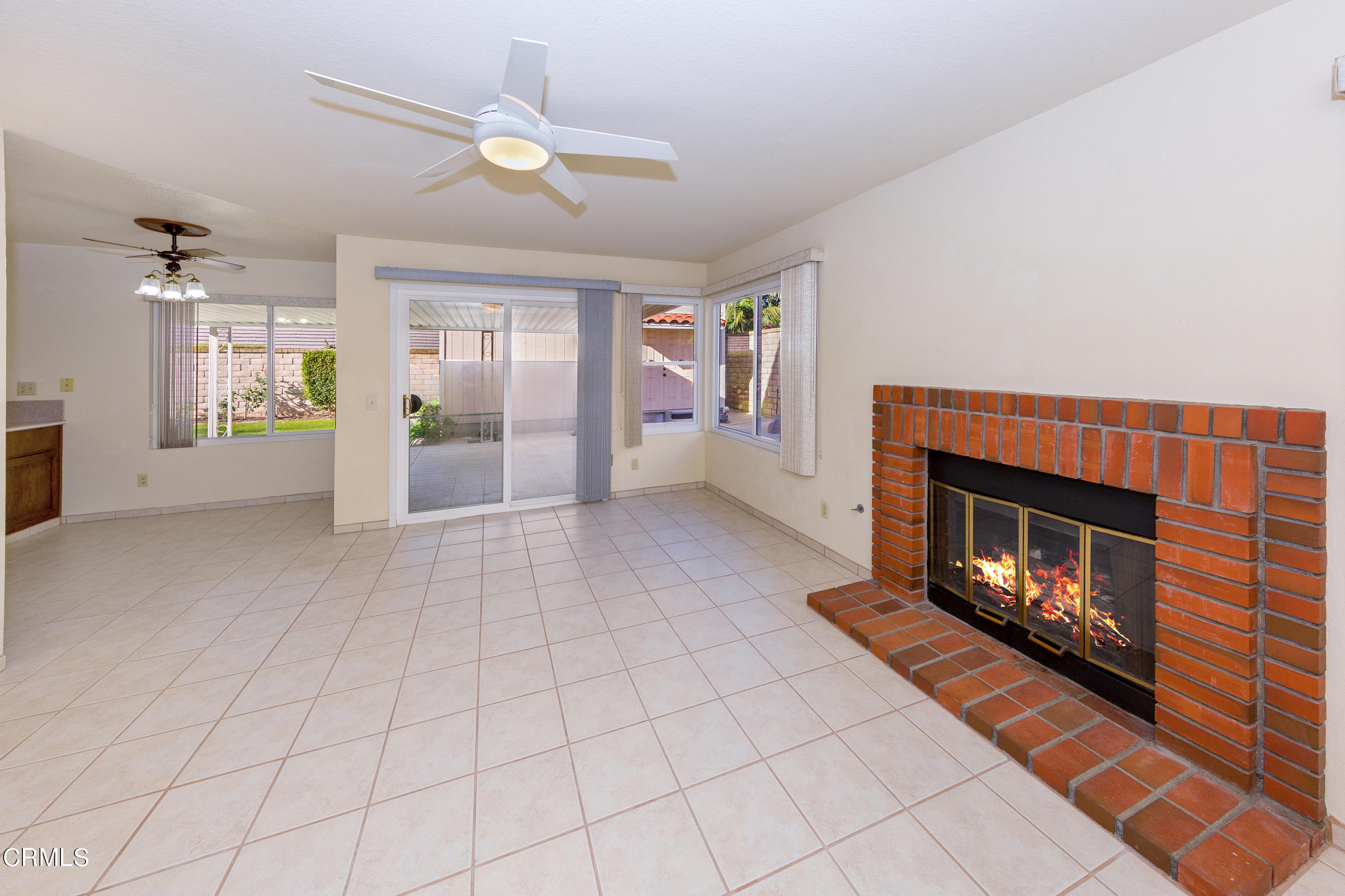 6025 Palomar Circle Camarillo, CA 93012 - Photo 8 of 35 an empty room with windows and fireplace