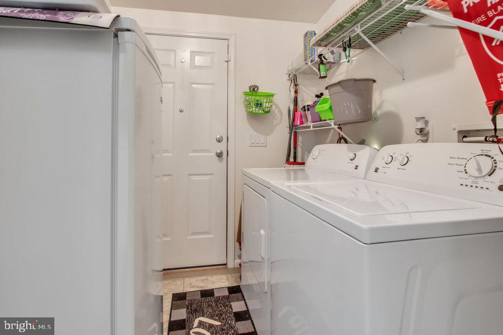 1125 Lorenzo Lane, Unit 274 Smyrna, DE 19977 - Photo 25 of 43 a bathroom with a sink and a mirror