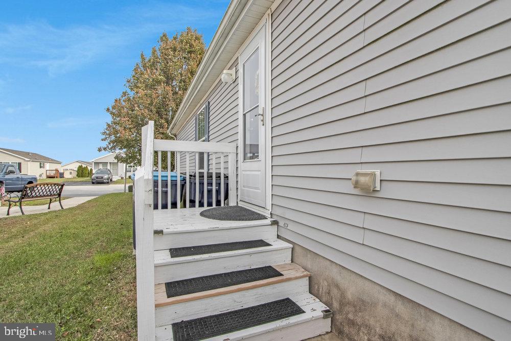 1125 Lorenzo Lane, Unit 274 Smyrna, DE 19977 - Photo 37 of 43 a view of wooden deck in the backyard
