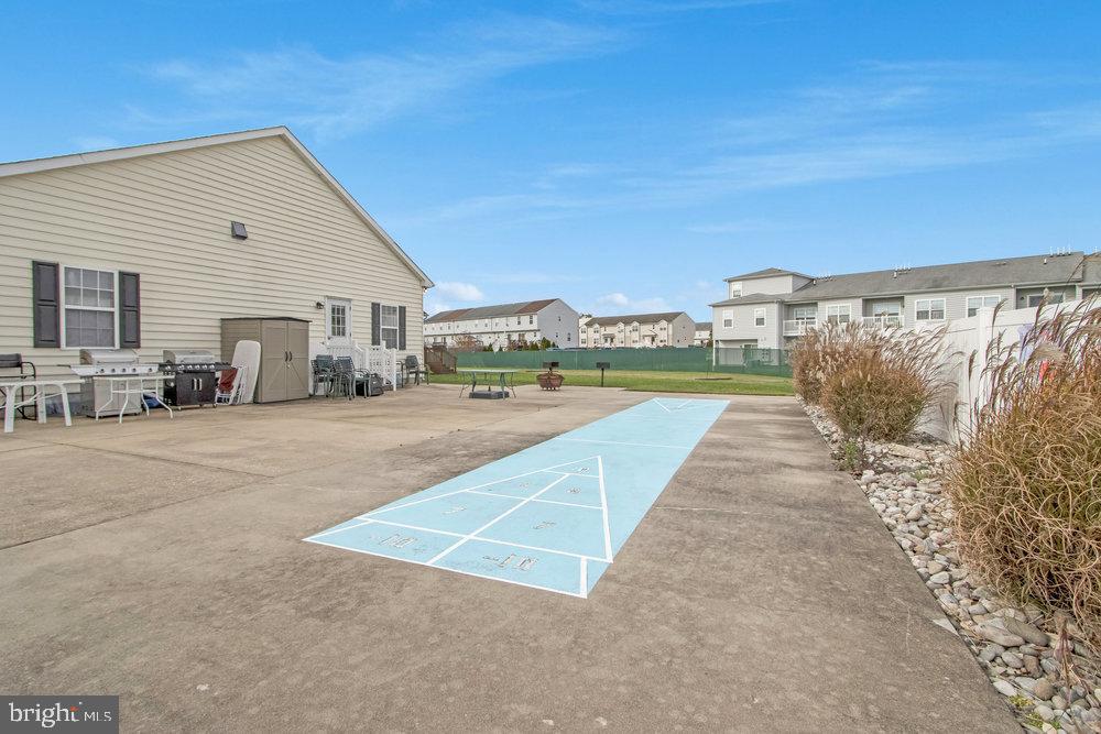 1125 Lorenzo Lane, Unit 274 Smyrna, DE 19977 - Photo 39 of 43 a view of swimming pool with outdoor seating