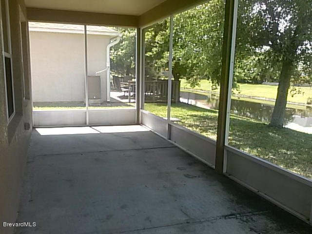 977 Riviera Point Drive Rockledge, FL 32955 - Photo 10 of 11 porch