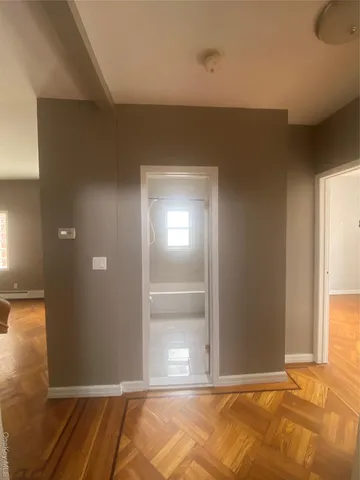 a view of a kitchen with a sink and a stove top oven