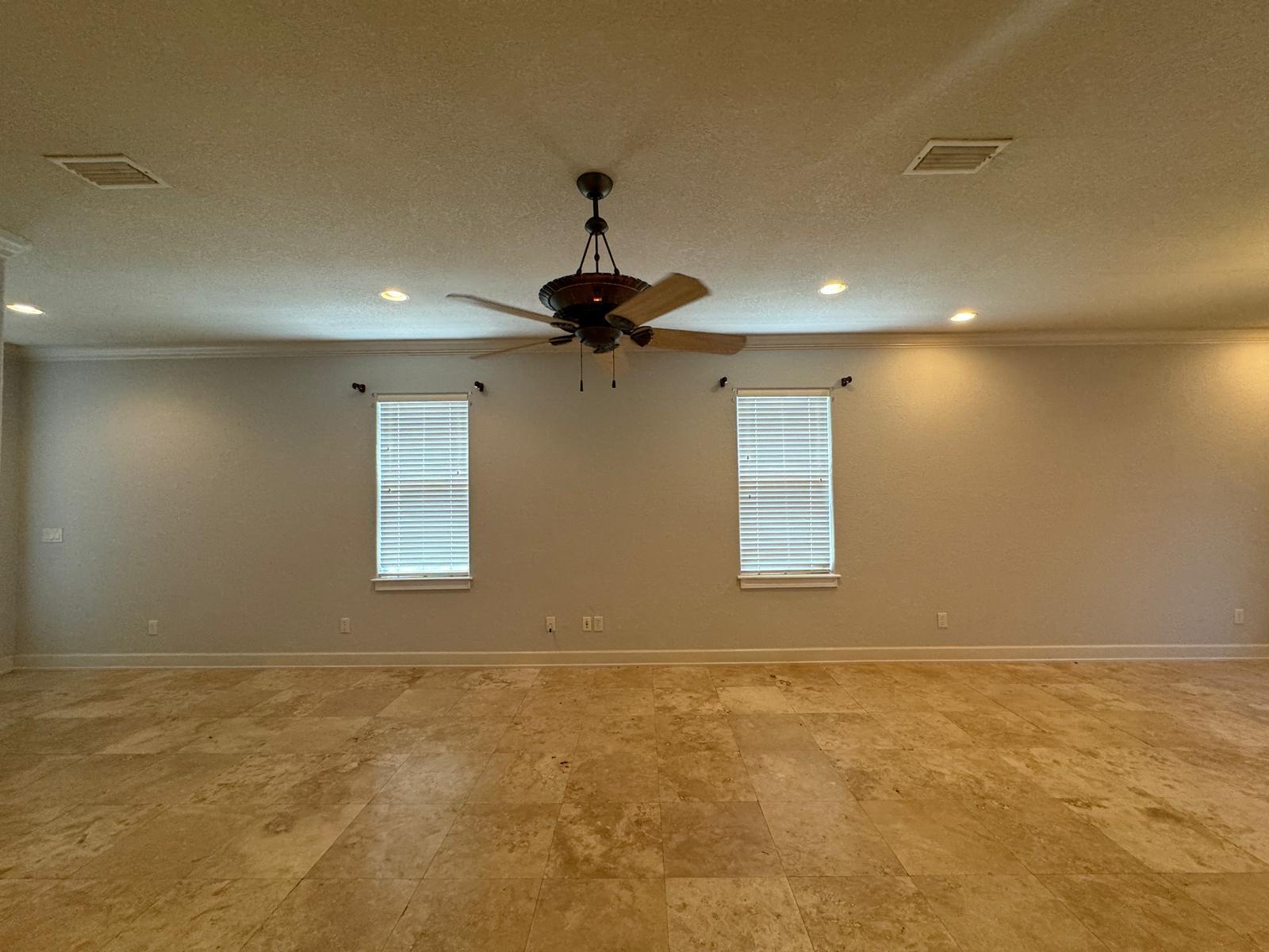 241 Inverrary Drive Destin, FL 32541 - Photo 4 of 24 a view of an empty room with a window