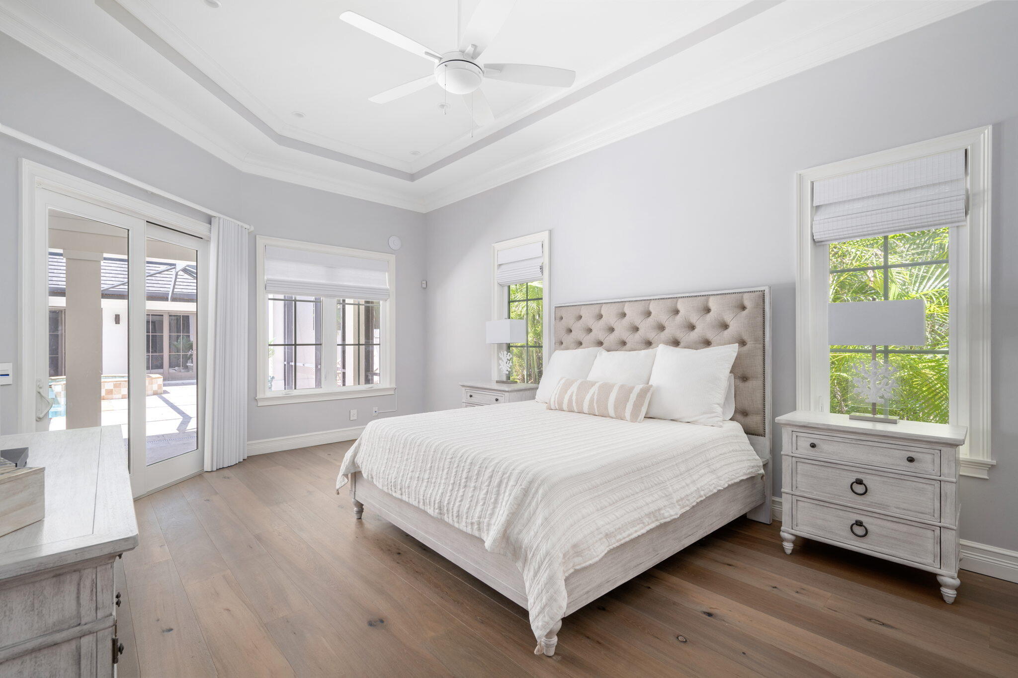 544 Live Oak Road Vero Beach, FL 32963 - Photo 19 of 55 a bedroom with a bed and a window