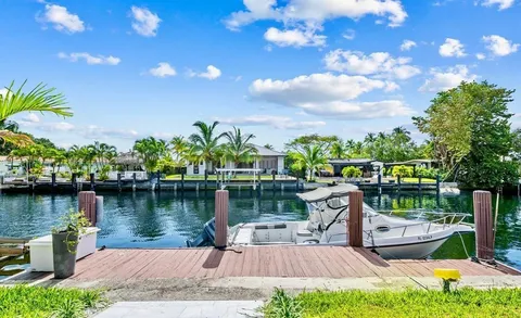 a view of a lake with a garden