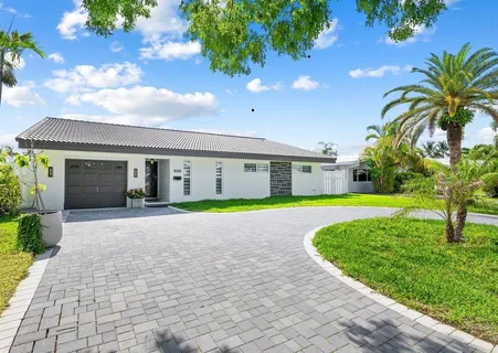a view of house with a garden