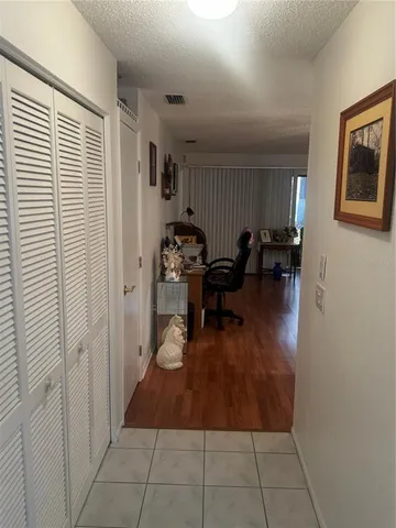 a living room with furniture and a gate