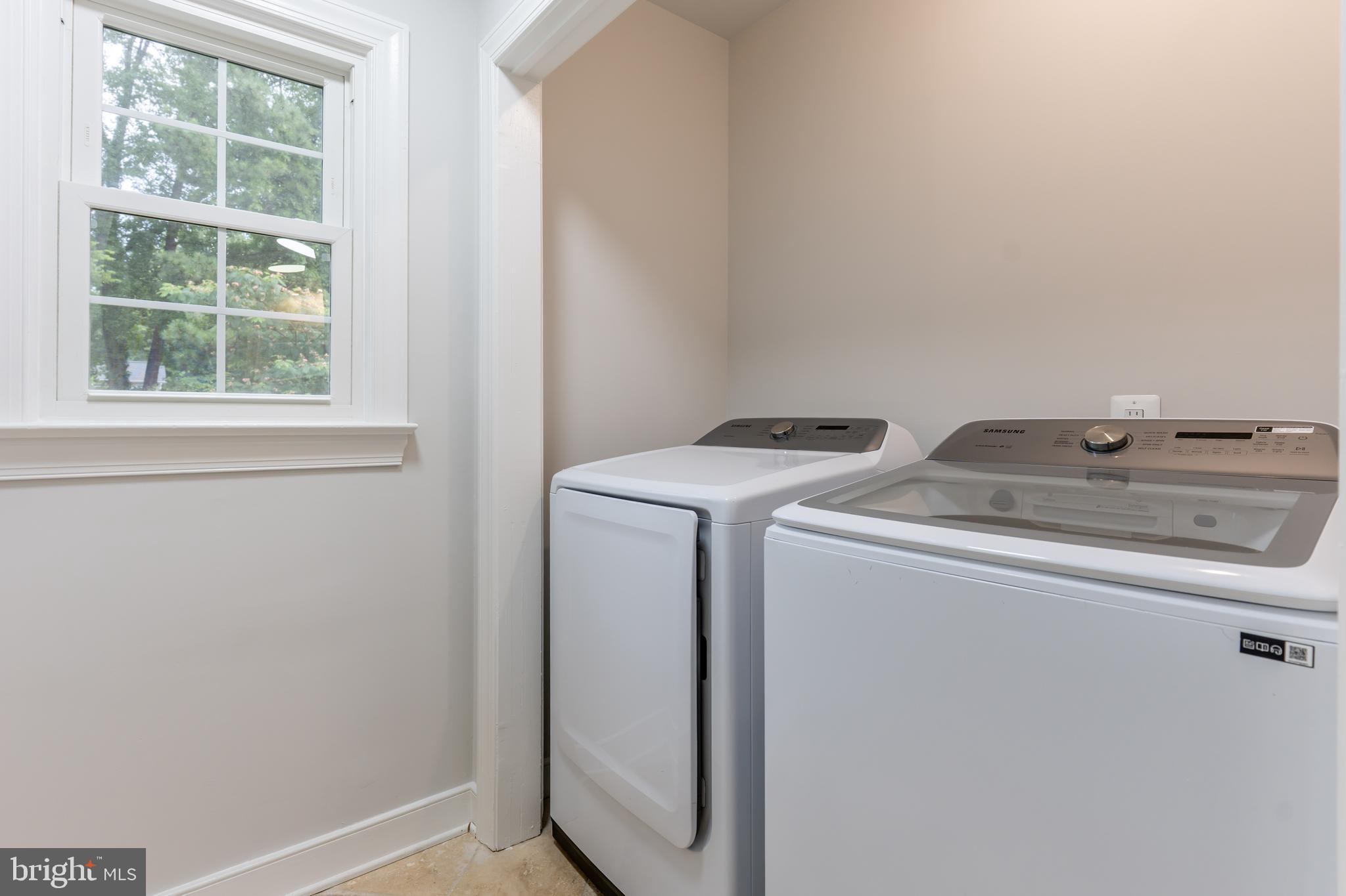 142 Woodland Road Fredericksburg, VA 22401 - Photo 12 of 49 a utility room with dryer and washer