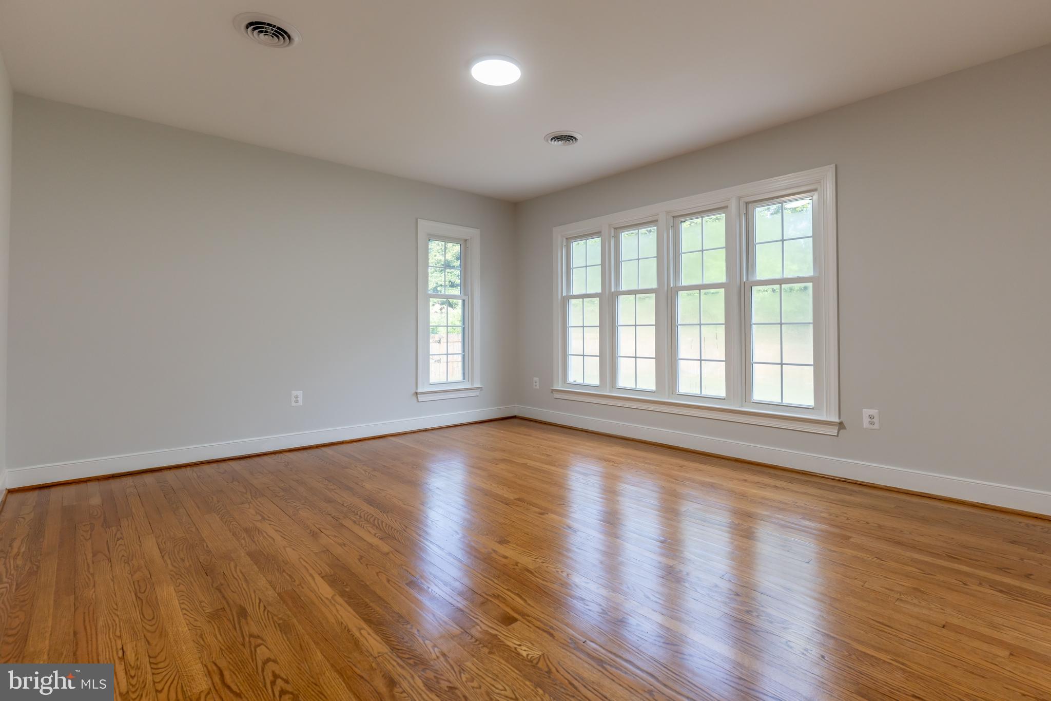 142 Woodland Road Fredericksburg, VA 22401 - Photo 26 of 49 a view of an empty room with wooden floor and a window