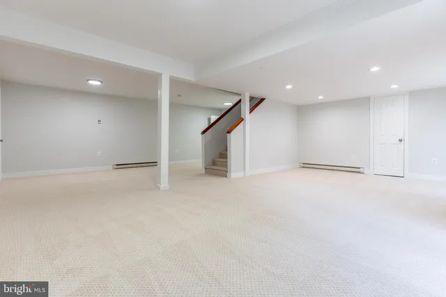 an empty room with entrance and door