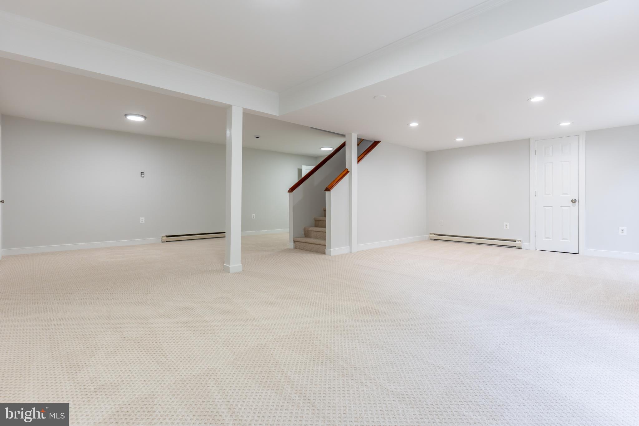 142 Woodland Road Fredericksburg, VA 22401 - Photo 38 of 49 an empty room with entrance and door