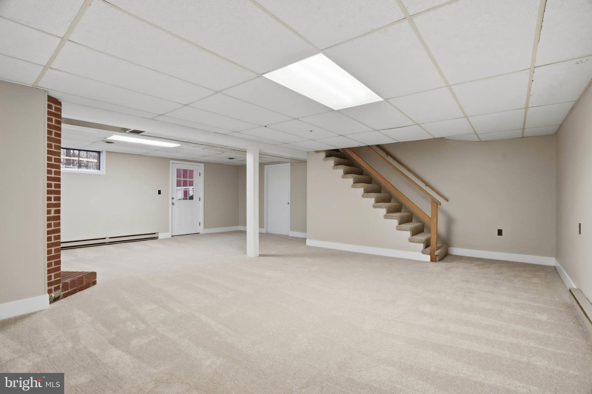 5407 Solomons Island Road Lothian, MD 20711 - Photo 28 of 42 a view of an empty room with stairs