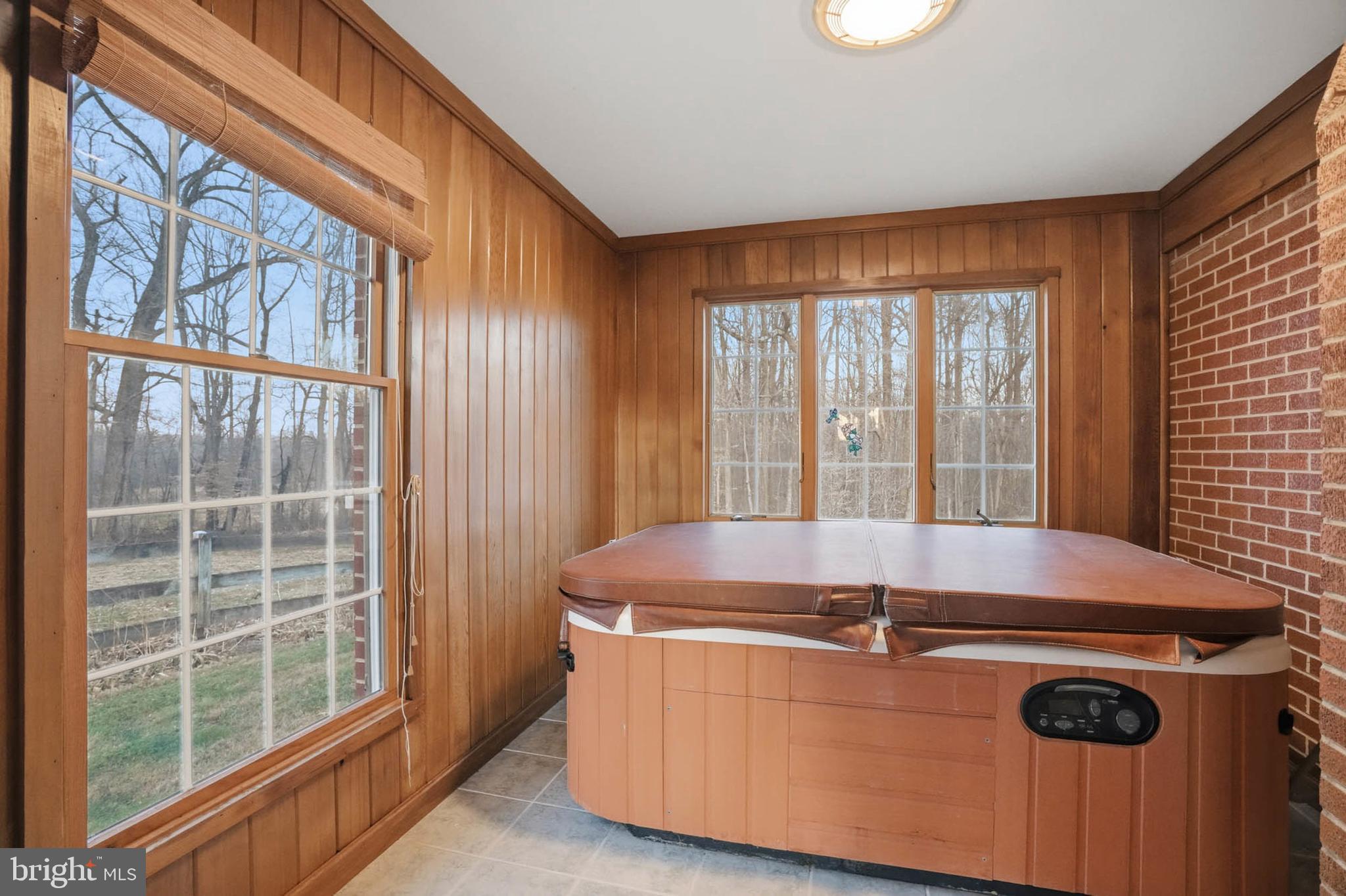 5407 Solomons Island Road Lothian, MD 20711 - Photo 9 of 42 a room with wooden floor and a sink