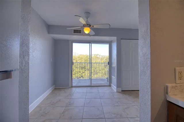 a kitchen that has a sink and a stove
