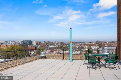 a view of a terrace with city view