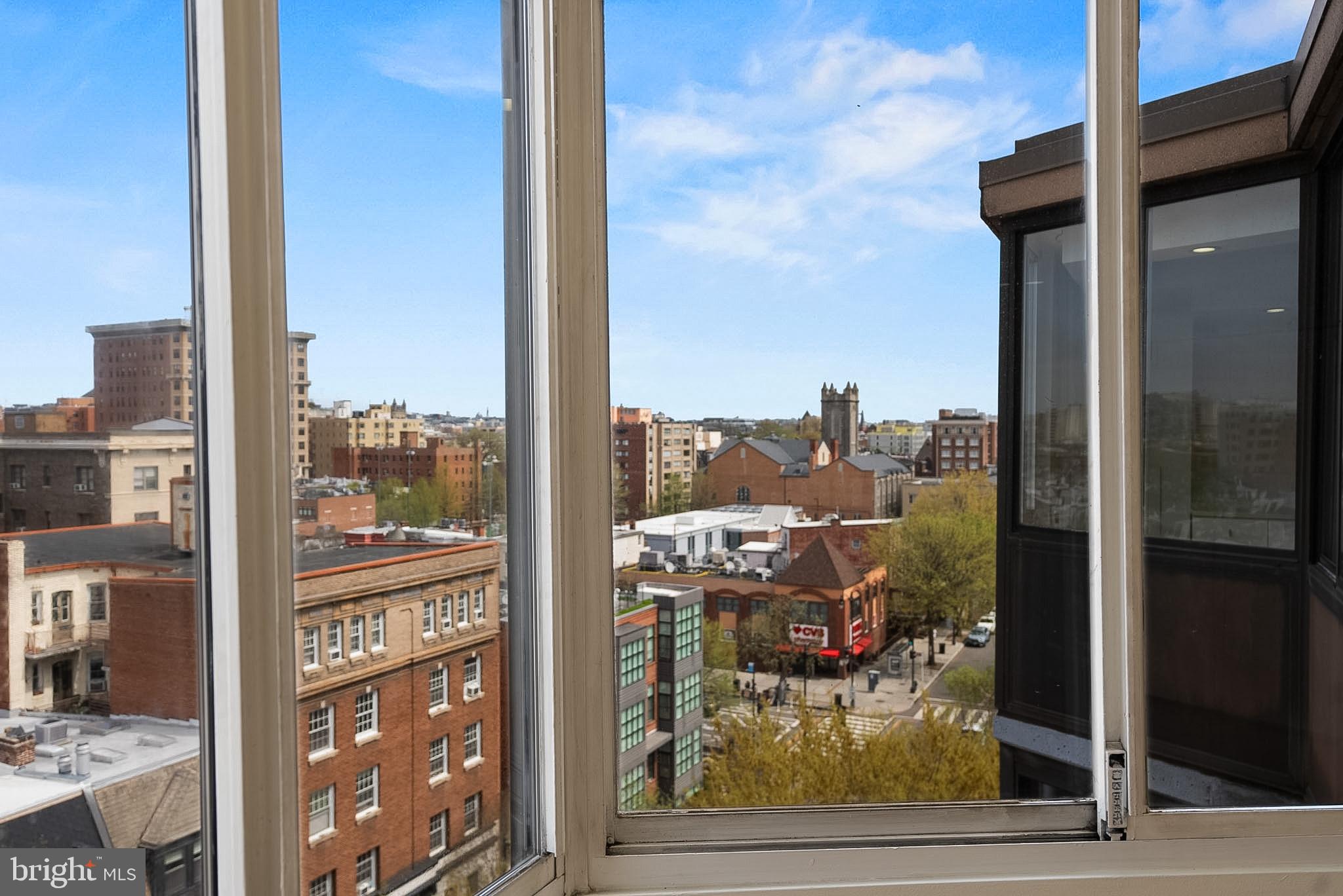1718 P Street Northwest, Unit 902 Washington, DC 20036 - Photo 10 of 17 a view of a city from a living room