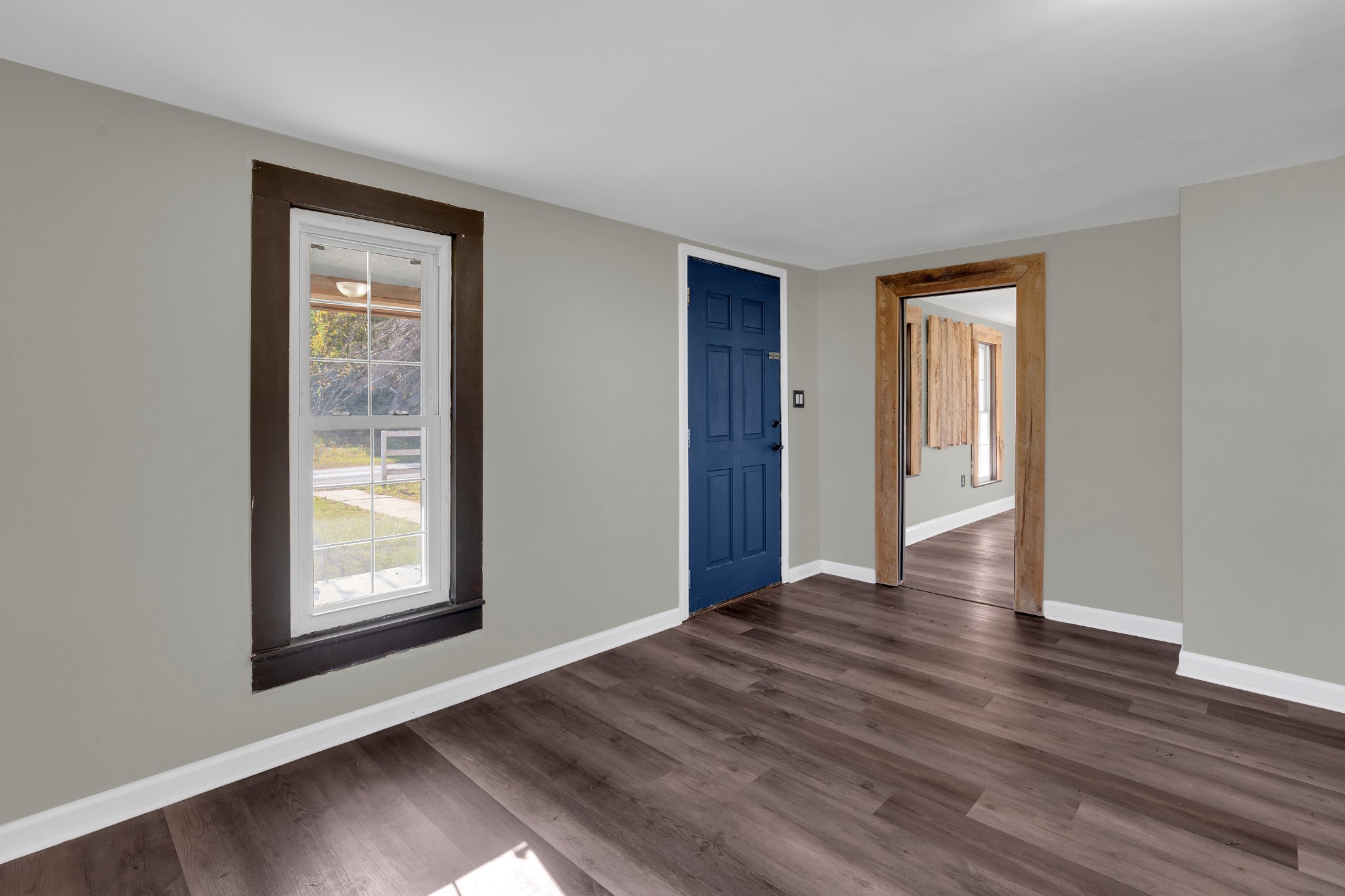 490 Shady Grove Road Manchester, TN 37355 - Photo 14 of 49 a view of an empty room with wooden floor and a window