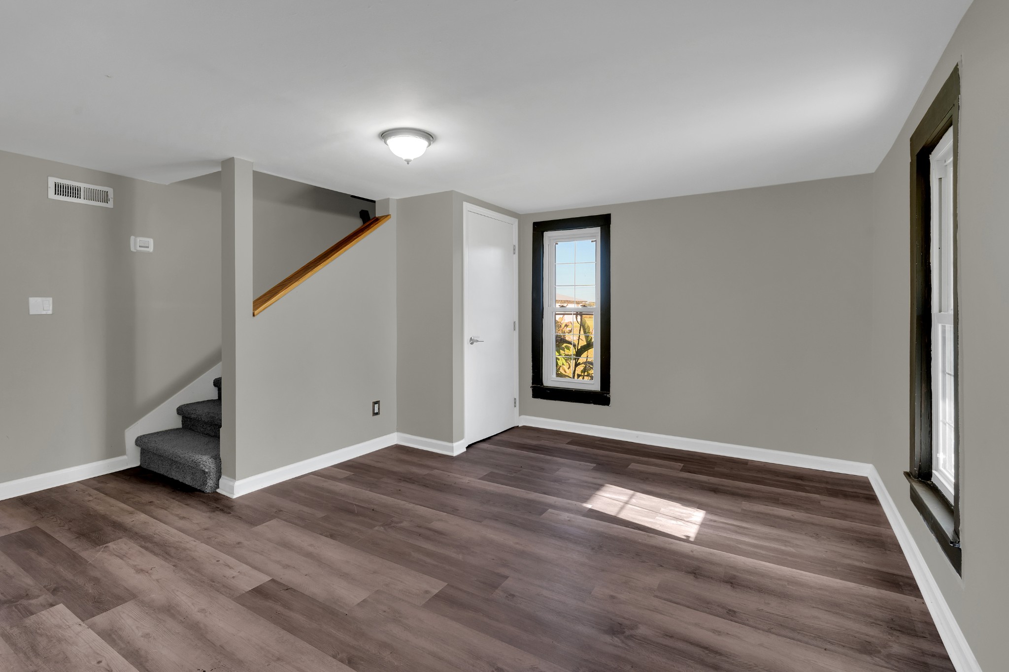 490 Shady Grove Road Manchester, TN 37355 - Photo 18 of 49 a view of empty room with wooden floor and stairs