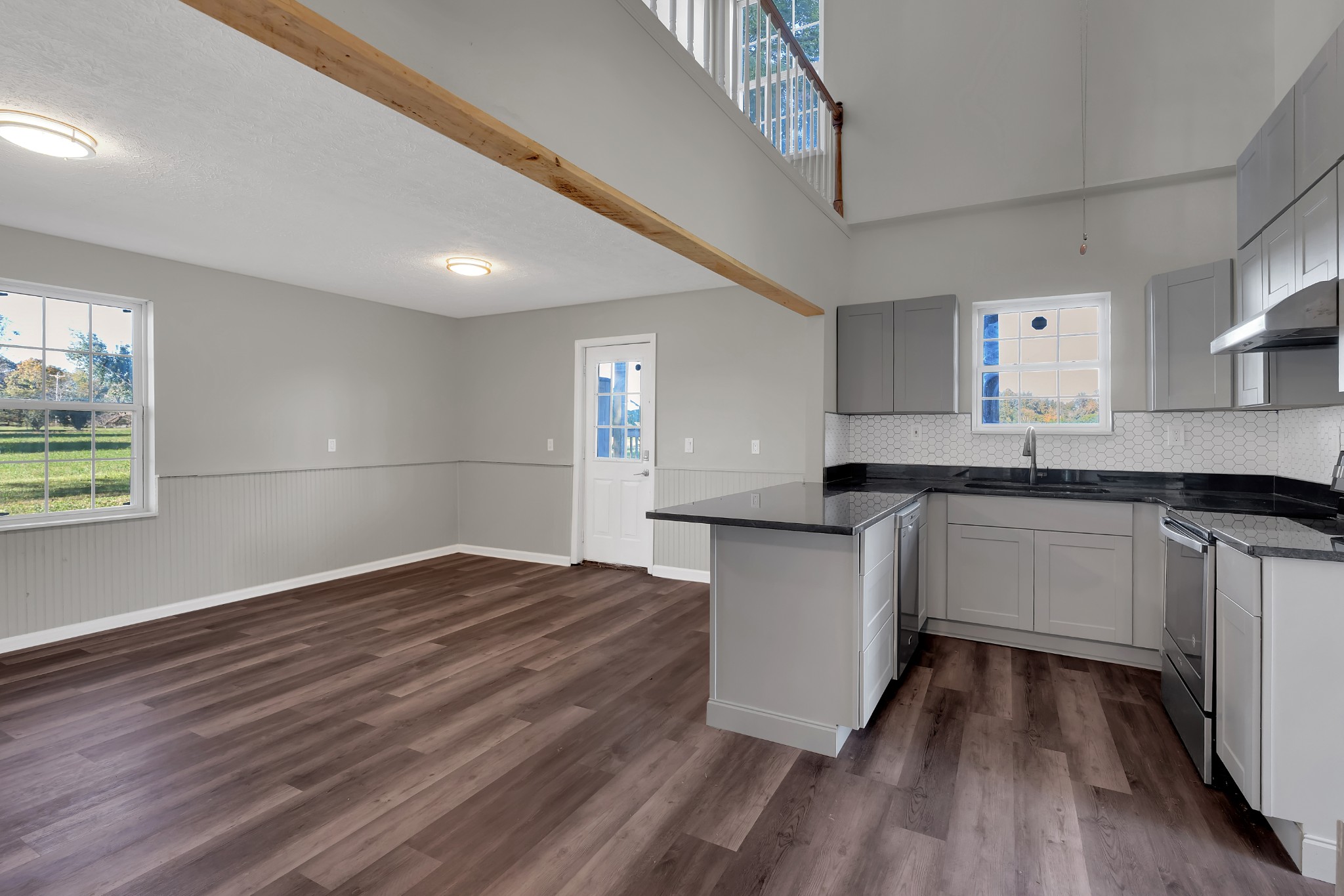 490 Shady Grove Road Manchester, TN 37355 - Photo 29 of 49 a kitchen with granite countertop a stove a sink and a refrigerator