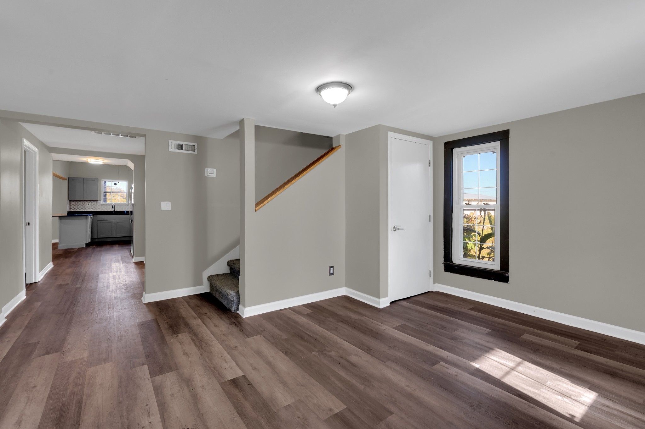 490 Shady Grove Road Manchester, TN 37355 - Photo 38 of 49 a view of a big room with wooden floor and windows