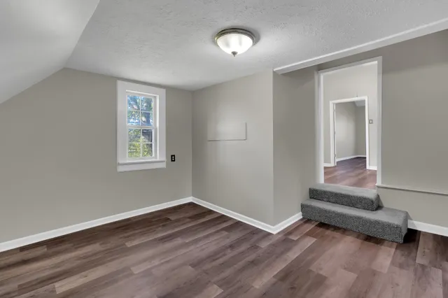 a room with window and a wooden floor