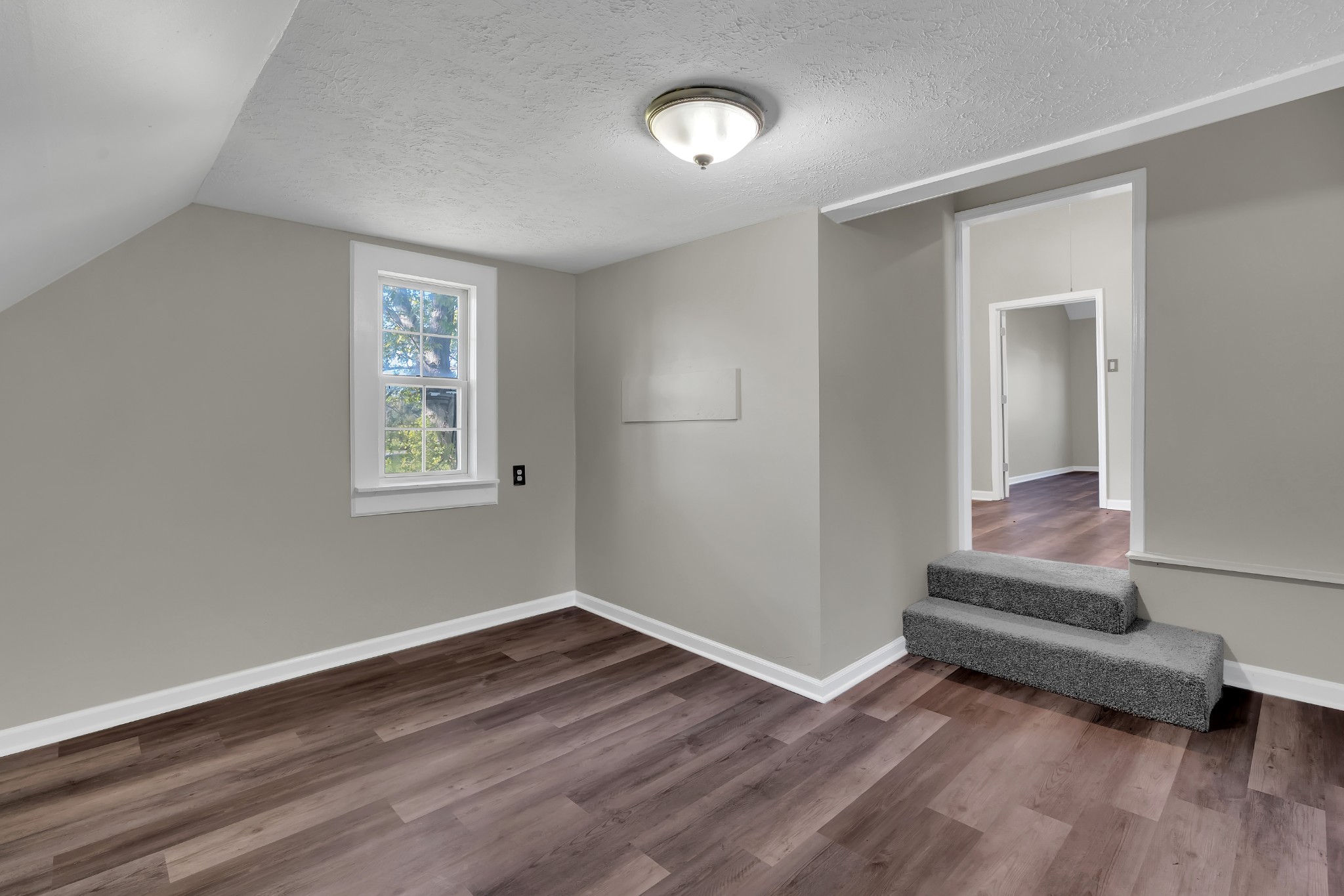 490 Shady Grove Road Manchester, TN 37355 - Photo 43 of 49 a room with window and a wooden floor