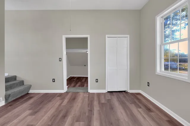wooden floor with window in an empty room