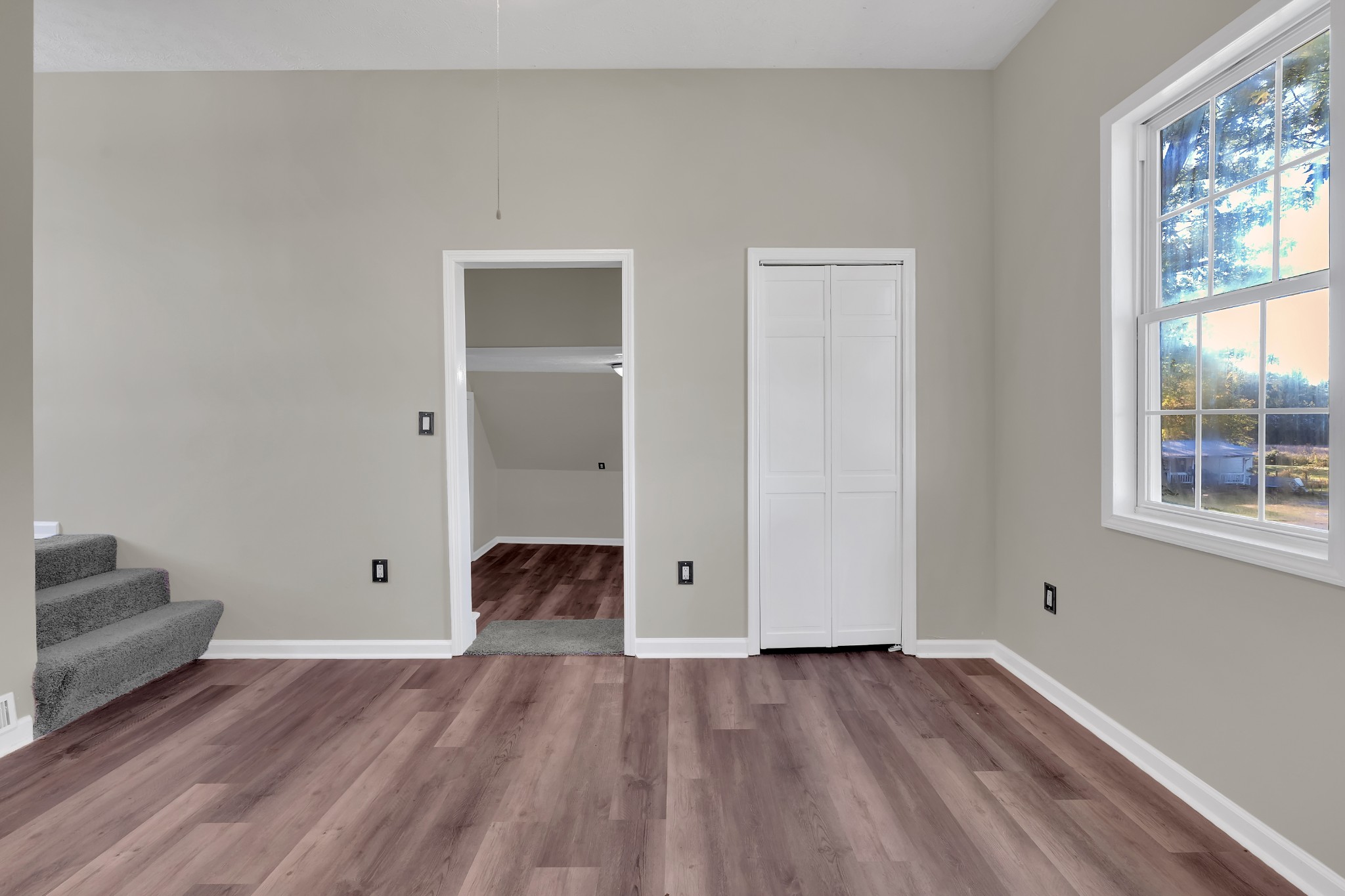 490 Shady Grove Road Manchester, TN 37355 - Photo 46 of 49 wooden floor with window in an empty room