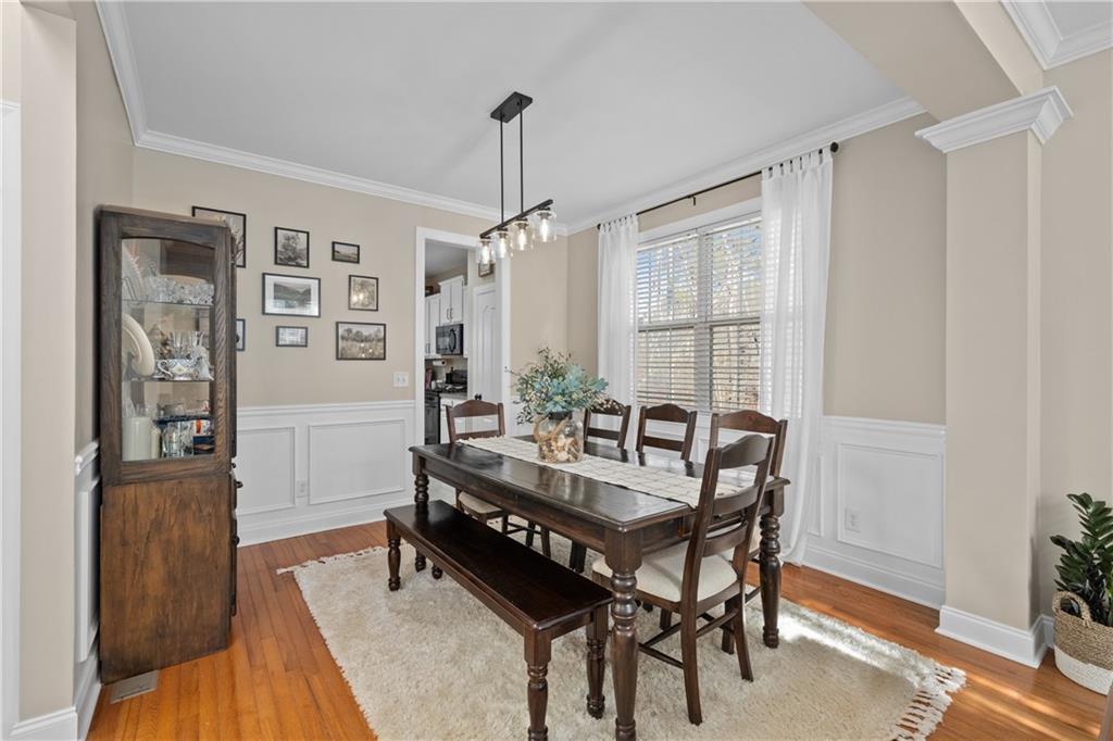 129 Boulder View Court Dallas, GA 30157 - Photo 14 of 43 a view of a dining room with furniture window and wooden floor