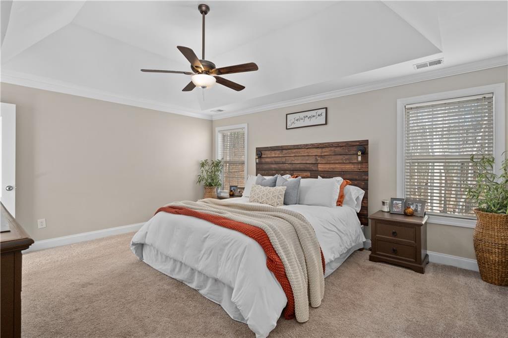 129 Boulder View Court Dallas, GA 30157 - Photo 21 of 43 a bedroom with a bed and window