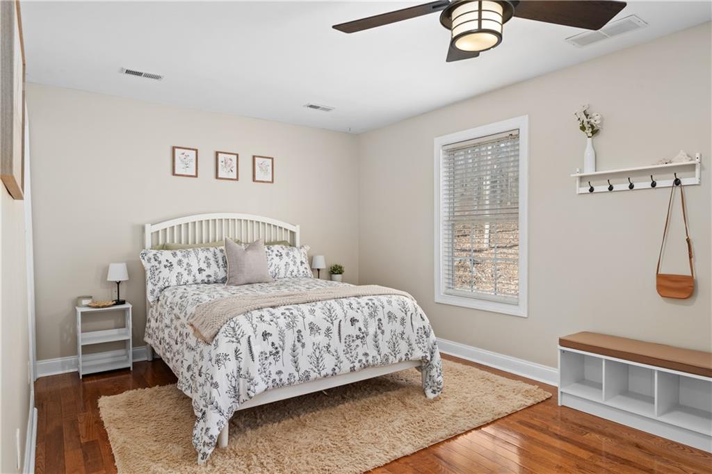 129 Boulder View Court Dallas, GA 30157 - Photo 25 of 43 a bedroom with a bed and a window